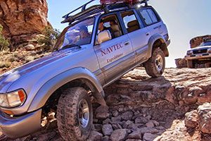 Toyota Landcruiser overlooking the Colorado River on the White Rim